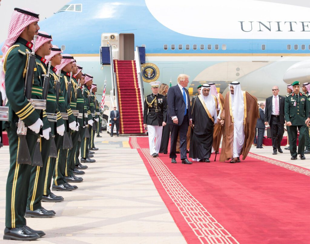 Saudi Arabia's King Salman bin Abdulaziz Al Saud and U.S. President Donald Trump walk during a reception ceremony in Riyadh