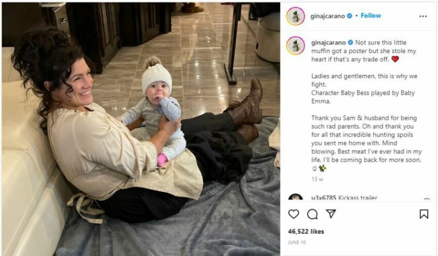 Gina Carano holding baby