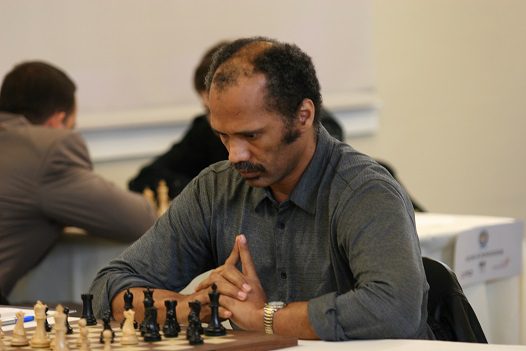 Emory Tate Playing Chess